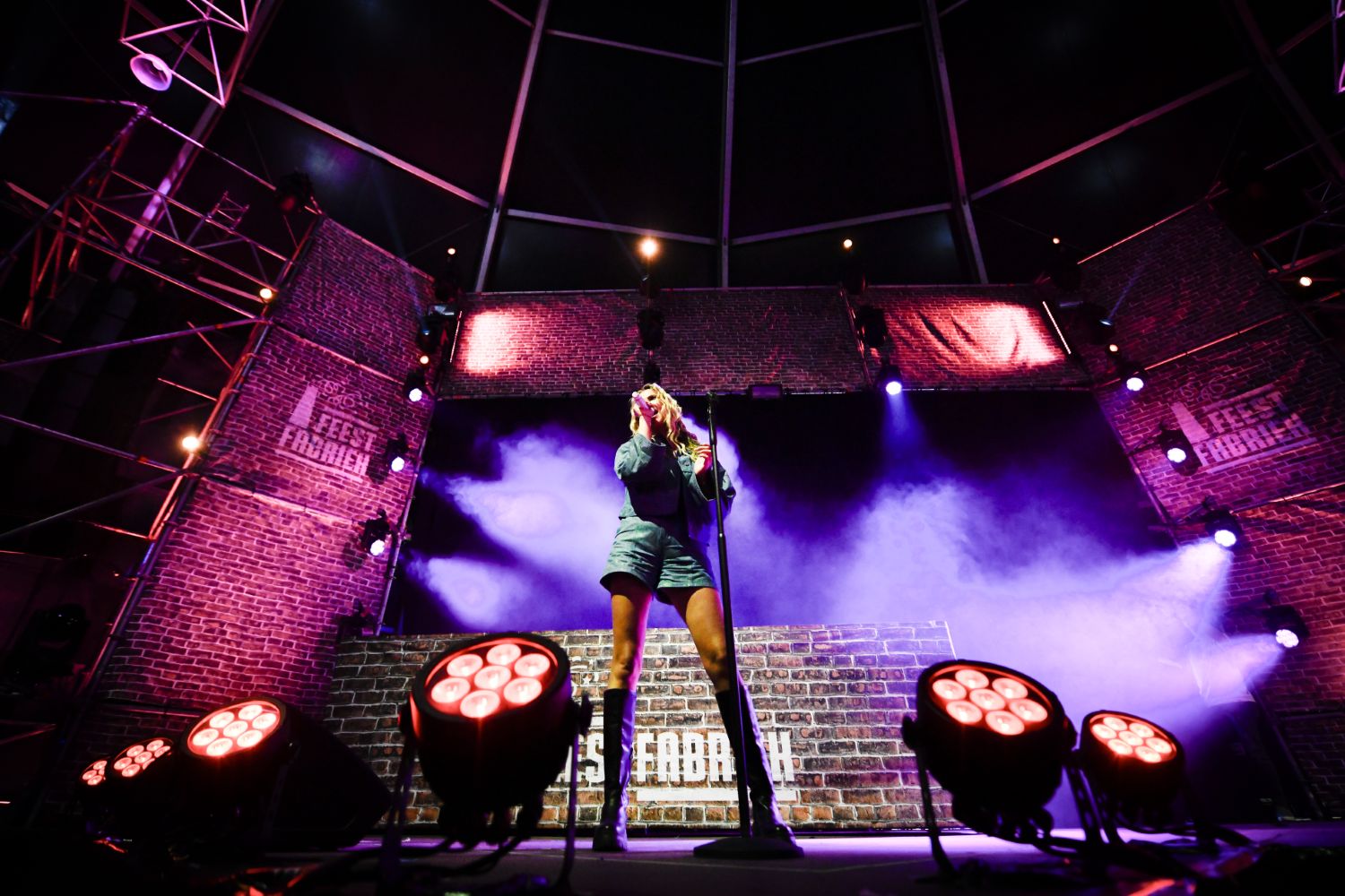 Performer in a truss stage